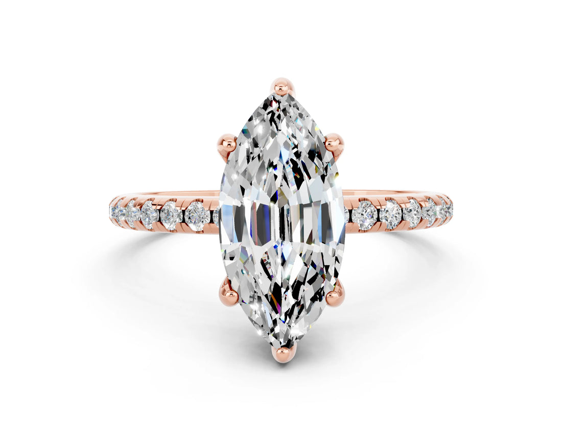 Rose gold Marquise Cut Diamond Solitaire Ring with Four-Prong Setting and Pavé Band