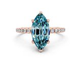 Rose gold Marquise Cut Diamond Solitaire Ring with Four-Prong Setting and Pavé Band