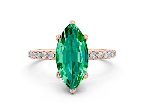 Rose gold Marquise Cut Diamond Solitaire Ring with Four-Prong Setting and Pavé Band