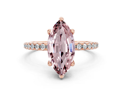 Rose gold Marquise Cut Diamond Solitaire Ring with Four-Prong Setting and Pavé Band