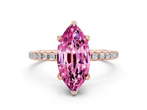 Rose gold Marquise Cut Diamond Solitaire Ring with Four-Prong Setting and Pavé Band