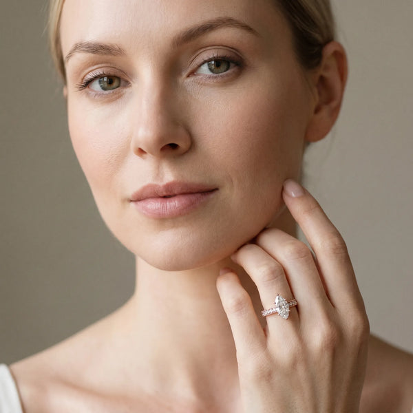 Rose gold Marquise Cut Diamond Solitaire Ring with Milgrain Pave Band and Four Prong Setting