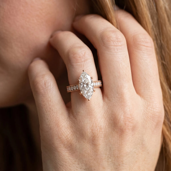 Rose gold Marquise Cut Diamond Solitaire Ring with Milgrain Pave Band and Four Prong Setting