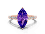Rose gold Marquise Cut Diamond Solitaire Ring with Pavé Band and Prong Setting