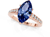 Rose gold Marquise Cut Diamond Solitaire Ring with Pavé Band and Prong Setting_1