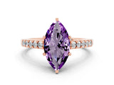 Rose gold Marquise Cut Diamond Solitaire Ring with Pavé Band and Prong Setting