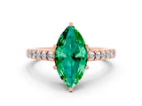 Rose gold Marquise Cut Diamond Solitaire Ring with Pavé Band and Prong Setting