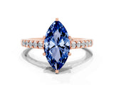 Rose gold Marquise Cut Diamond Solitaire Ring with Pavé Band and Prong Setting
