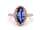 Rose gold Marquise Cut Diamond Solitaire Ring with Shared Prong Pavé Band
