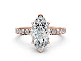 Rose gold Marquise Cut Diamond Solitaire with Pave Band and Four-Prong Setting