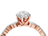 Rose gold Marquise Cut Diamond Solitaire with Side Stones on a Pavé Band and Four-Prong Setting_74
