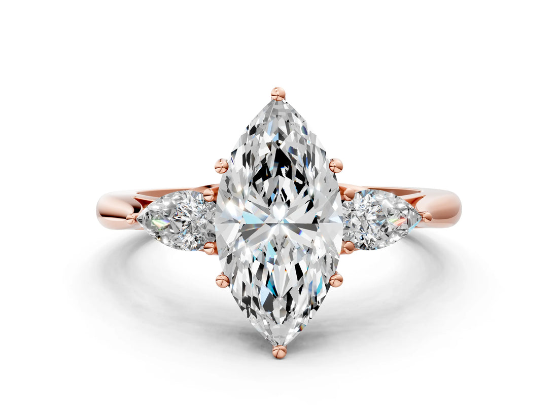 Rose gold Marquise Cut Diamond Three-Stone Ring with Pear Side Stones and Four-Prong Setting_104