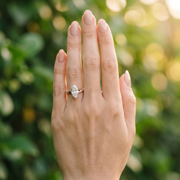 Rose gold Marquise Cut Diamond Twisted Band Engagement Ring with Prong Setting