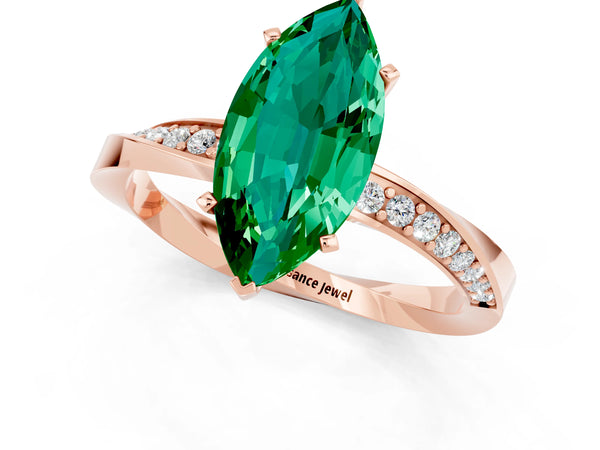 Rose gold Marquise Cut Emerald Engagement Ring with Side Stone Accents and Four-Prong Setting