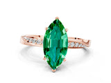 Rose gold Marquise Cut Emerald Engagement Ring with Side Stone Accents and Four-Prong Setting_27
