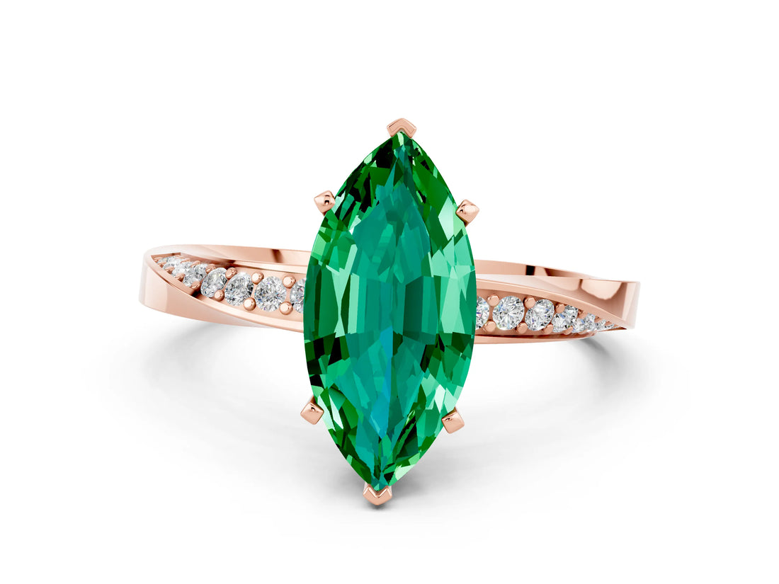 Rose gold Marquise Cut Emerald Engagement Ring with Side Stone Accents and Four-Prong Setting_60