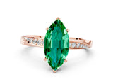 Rose gold Marquise Cut Emerald Engagement Ring with Side Stone Accents and Four-Prong Setting_60