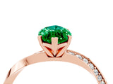 Rose gold Marquise Cut Emerald Engagement Ring with Side Stone Accents and Four-Prong Setting_64