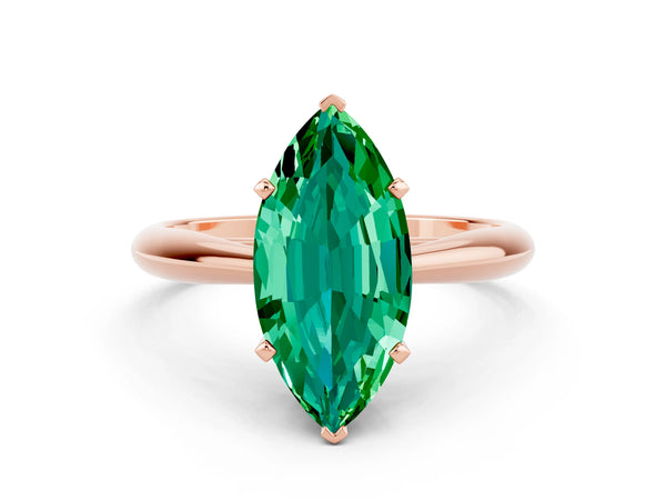 Rose gold Marquise Cut Emerald Solitaire Engagement Ring with Cathedral Setting and Four-Prong Mount