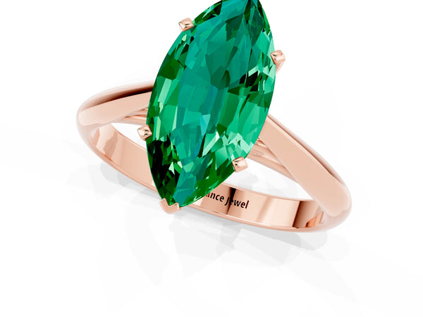 Rose gold Marquise Cut Emerald Solitaire Engagement Ring with Cathedral Setting and Four-Prong Mount