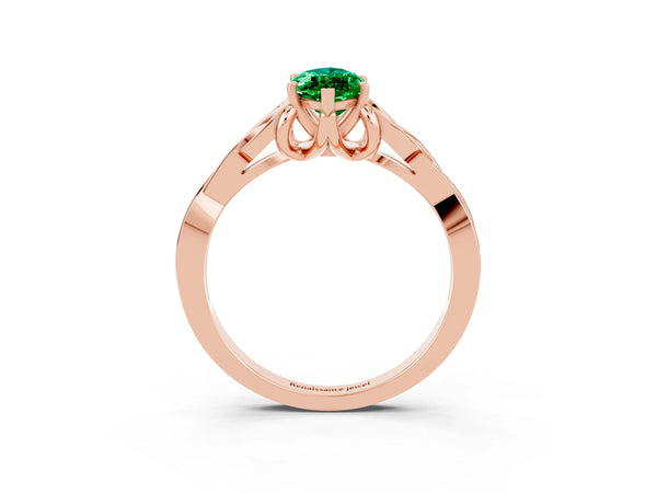 Rose gold Marquise Cut Emerald Solitaire Engagement Ring with Celtic Knot Band and Four-Prong Setting
