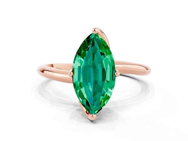 Rose gold Marquise Cut Emerald Solitaire Engagement Ring with Four-Prong Setting and Classic Band