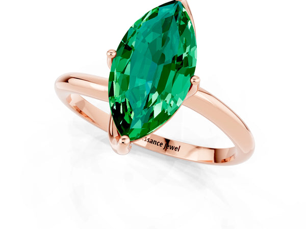 Rose gold Marquise Cut Emerald Solitaire Engagement Ring with Four-Prong Setting and Classic Band