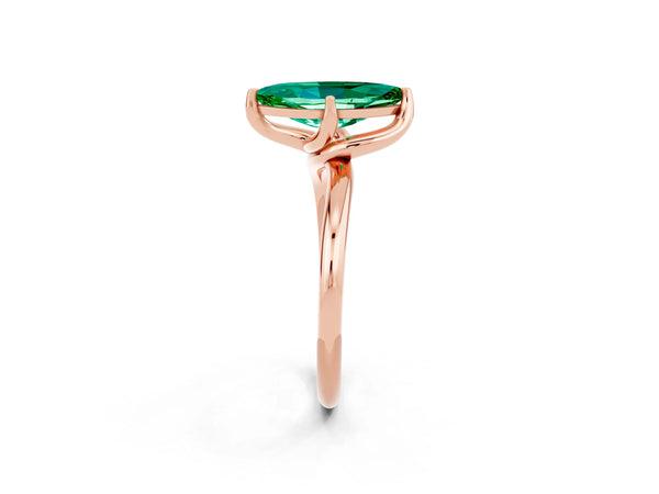 Rose gold Marquise Cut Emerald Solitaire Engagement Ring with Four-Prong Setting and Classic Band