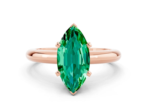 Rose gold Marquise Cut Emerald Solitaire Engagement Ring with Round Band and Four-Prong Setting