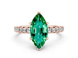 Rose gold Marquise Cut Emerald Solitaire Pavé Engagement Ring with Round Band and Prong Setting_60