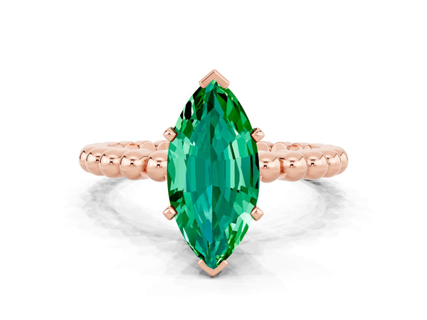 Rose gold Marquise Cut Emerald Solitaire Ring with Beaded Band and Prong Setting