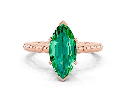 Rose gold Marquise Cut Emerald Solitaire Ring with Beaded Band and Prong Setting