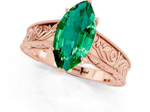 Rose gold Marquise Cut Emerald Solitaire Ring with Engraved Band and Four-Prong Setting_1