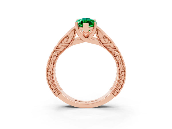 Rose gold Marquise Cut Emerald Solitaire Ring with Engraved Band and Four-Prong Setting