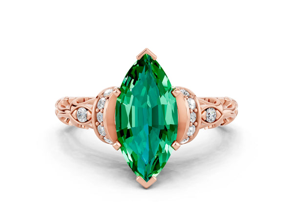 Rose gold Marquise Cut Emerald Solitaire Ring with Filigree Band and Four-Prong Setting