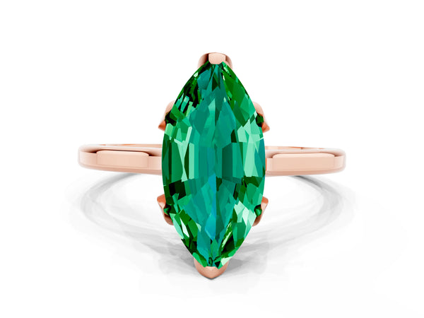 Rose gold Marquise Cut Emerald Solitaire Ring with Flower Prong Setting and Classic Band
