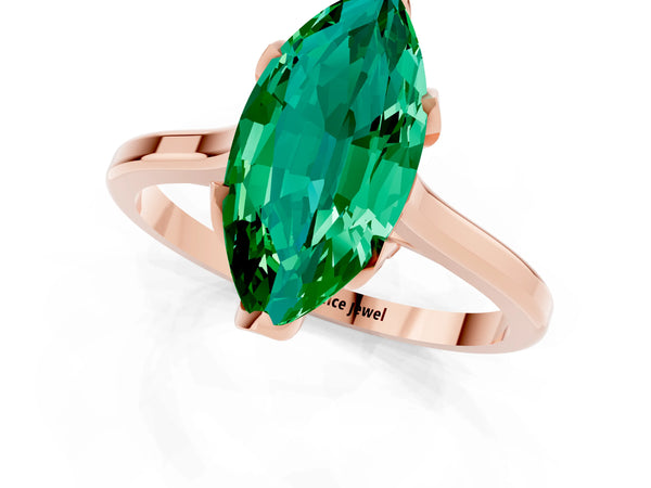 Rose gold Marquise Cut Emerald Solitaire Ring with Flower Prong Setting and Classic Band