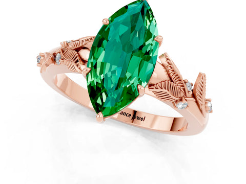 Rose gold Marquise Cut Emerald Solitaire Ring with Leaf Motif Band and Four-Prong Setting_1