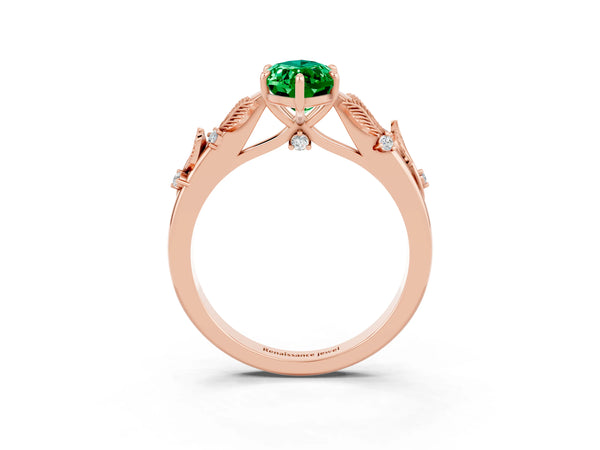 Rose gold Marquise Cut Emerald Solitaire Ring with Leaf Motif Band and Four-Prong Setting
