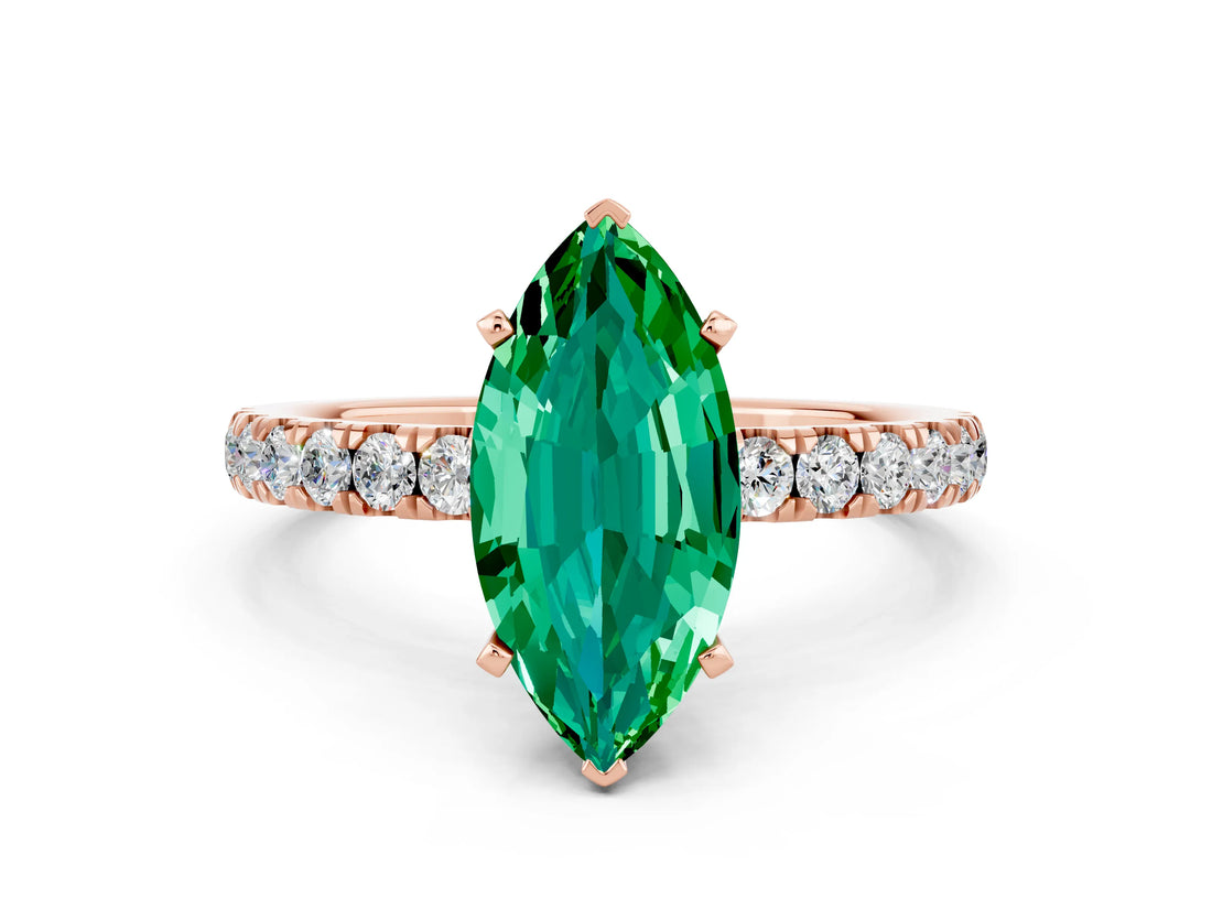 Rose gold Marquise Cut Emerald Solitaire Ring with Pavé Accents and Four-Prong Setting