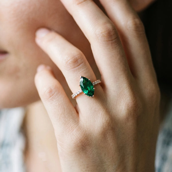 Rose gold Marquise Cut Emerald Solitaire Ring with Round  Pavé Band and Four-Prong Setting