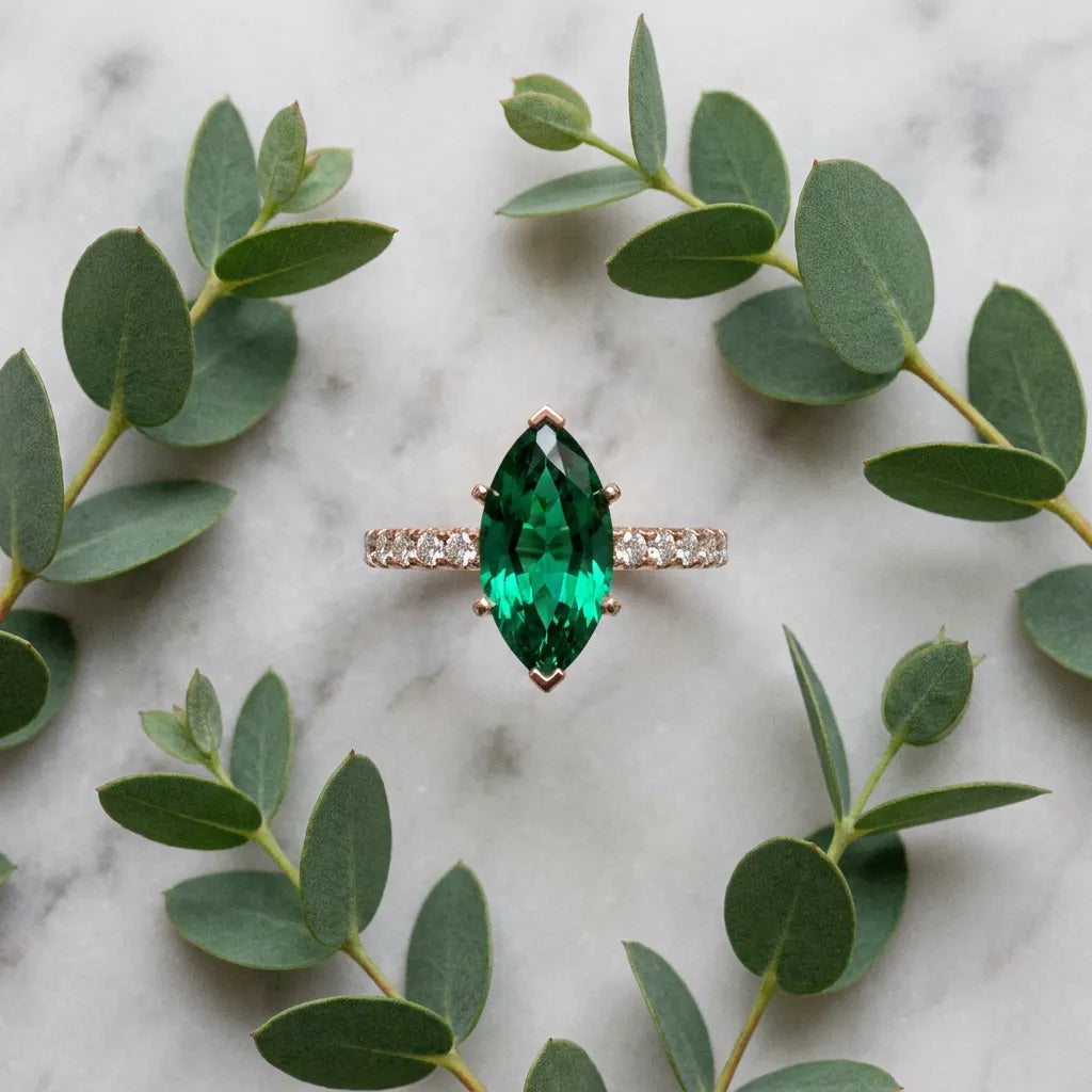 Rose gold Marquise Cut Emerald Solitaire Ring with Round  Pavé Band and Four-Prong Setting_45