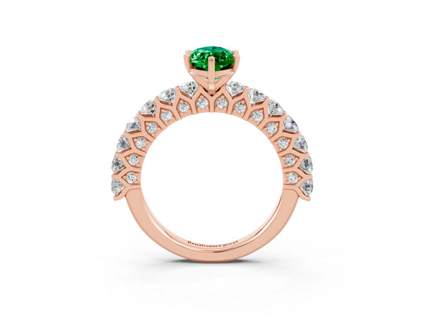 Rose gold Marquise Cut Emerald Solitaire Ring with Shared Prong Pavé Band and Four-Prong Setting
