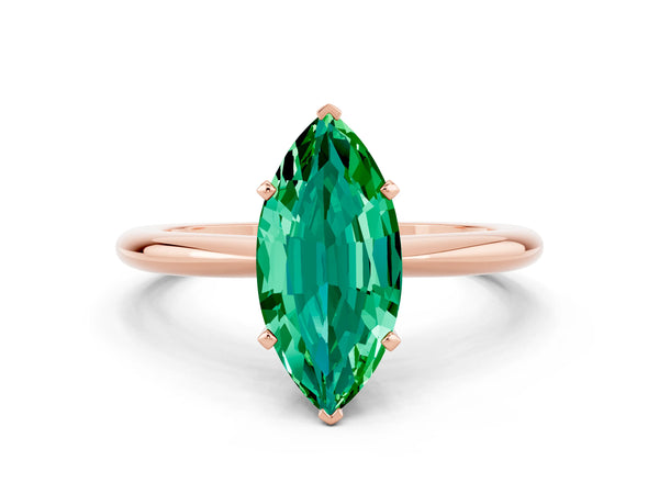 Rose gold Marquise Cut Emerald Solitaire Ring with Six-Prong Setting and Classic Band
