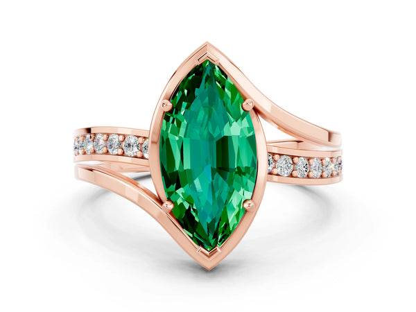 Rose gold Marquise Cut Emerald Solitaire Ring with Split Shank and Prong Setting