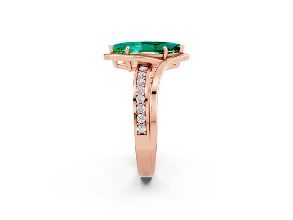 Rose gold Marquise Cut Emerald Solitaire Ring with Split Shank and Prong Setting