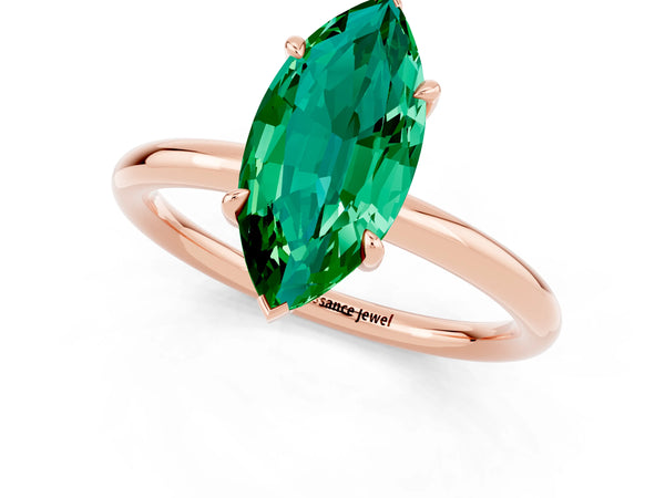 Rose gold Marquise Cut Emerald Solitaire Ring with Thin Band and Four-Prong Setting