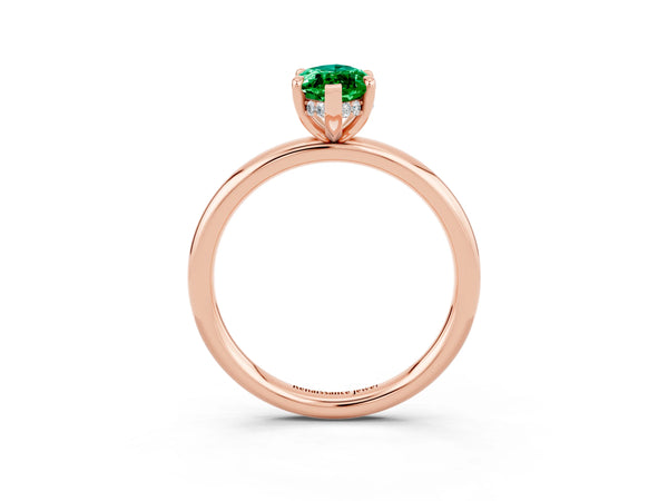 Rose gold Marquise Cut Emerald Solitaire Ring with Thin Band and Four-Prong Setting