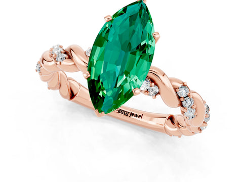 Rose gold Marquise Cut Emerald Solitaire Ring with Twisted Band and Pavé Accents_1