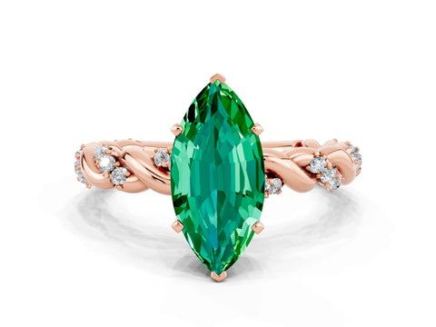 Rose gold Marquise Cut Emerald Solitaire Ring with Twisted Band and Pavé Accents